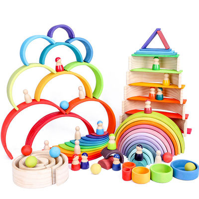 El bloque de madera de amontonamiento en colores pastel arqueado del arco iris 12pcs fijó los 38.5cm