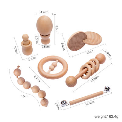 El gráfico confunde 7Pc Teether de madera para el anillo de dentición de madera del bebé