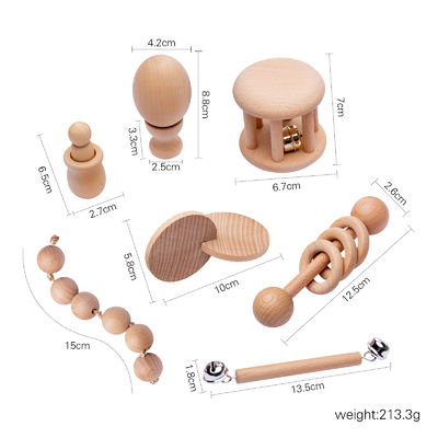 El gráfico confunde 7Pc Teether de madera para el anillo de dentición de madera del bebé