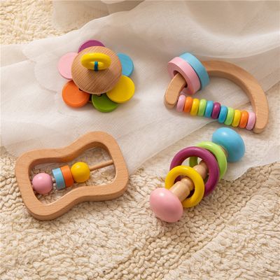 Grado de madera el echar los dientes Toy Wooden Rattle Teether Food de Soother el 11.6cm del traqueteo