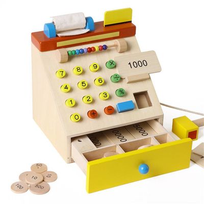 La caja registradora de madera de la simulación de los niños finge los juguetes del juego