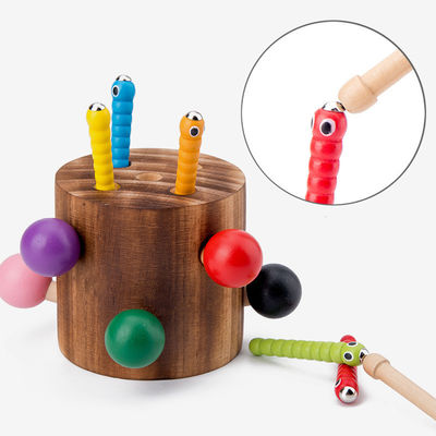 Captura de madera el juego del gusano para el entrenamiento de la coordinación del ojo de la mano de los niños