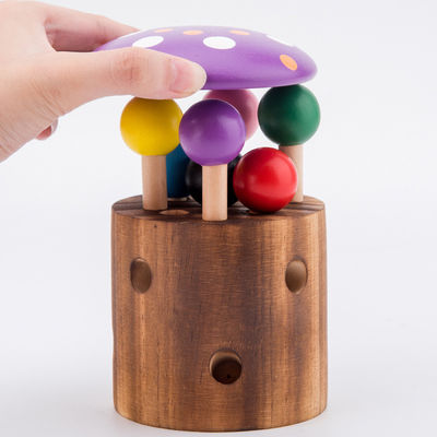 Captura de madera el juego del gusano para el entrenamiento de la coordinación del ojo de la mano de los niños