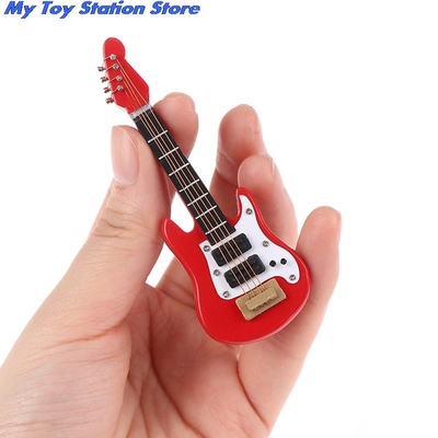Guitarra eléctrica de la música miniatura de la casa de muñecas del 1:12 para los niños Toy House Decor musical