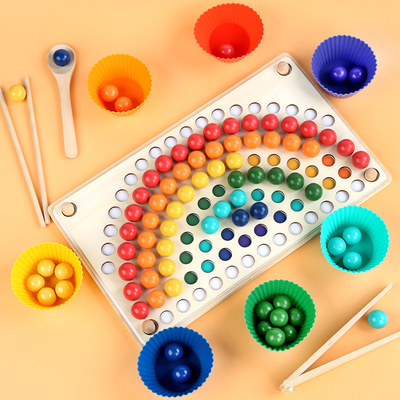 El arco iris nórdico de madera gotea el entrenamiento temprano de los palillos de la educación del rompecabezas del juego