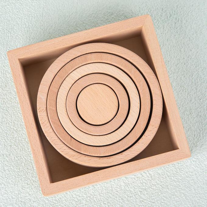 El rompecabezas de madera de la jerarquización del apilador bloquea a Montessori que apila el juego para las muchachas preescolares de los muchachos